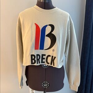 Gildan Cream Crewneck Shirt with White Tag. BRECK